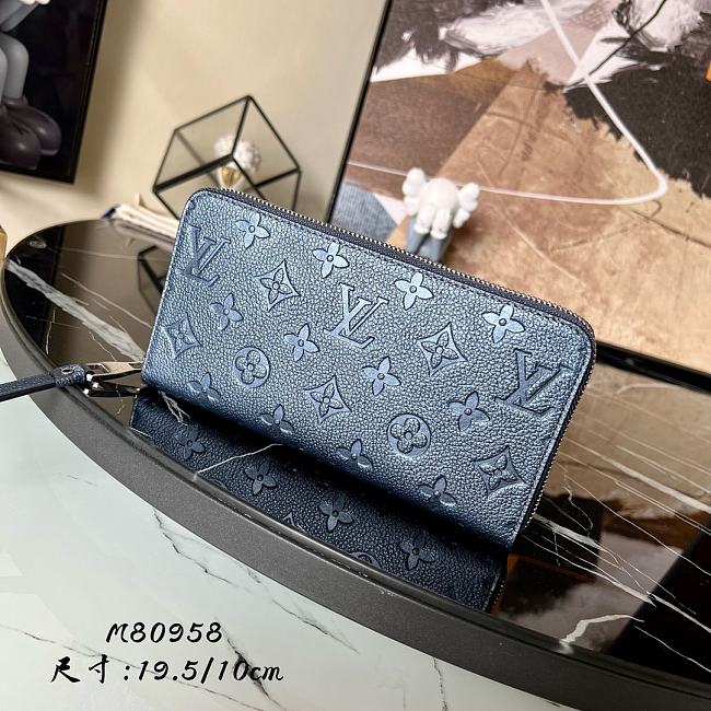 Louis Vuitton Monogram Empreinte Zipper wallet bestify - 1