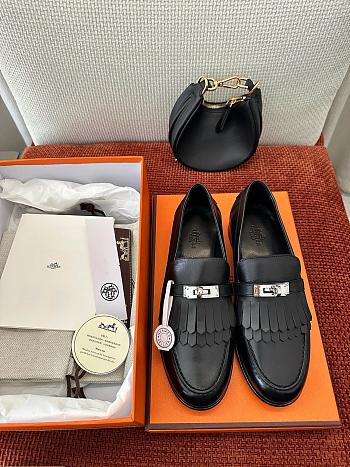 Hermès Destin loafers in black fringed calfskin with a Kelly buckle