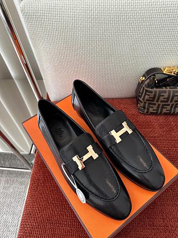 Hermès Paris loafers in black goatskin leather with a gold-plated H buckle