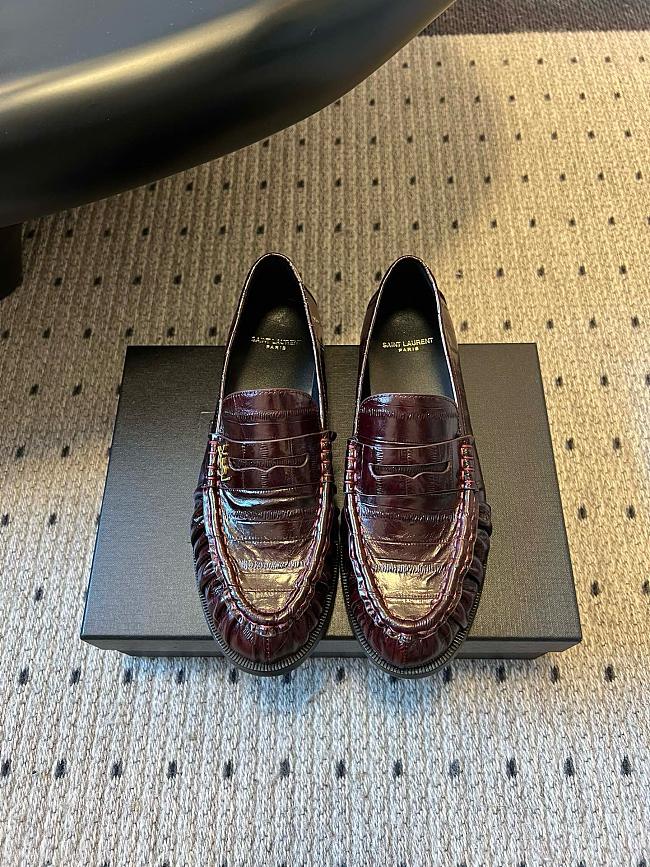 YSL Loafer loafers in black or brown eel leather with a gold-tone logo - 1